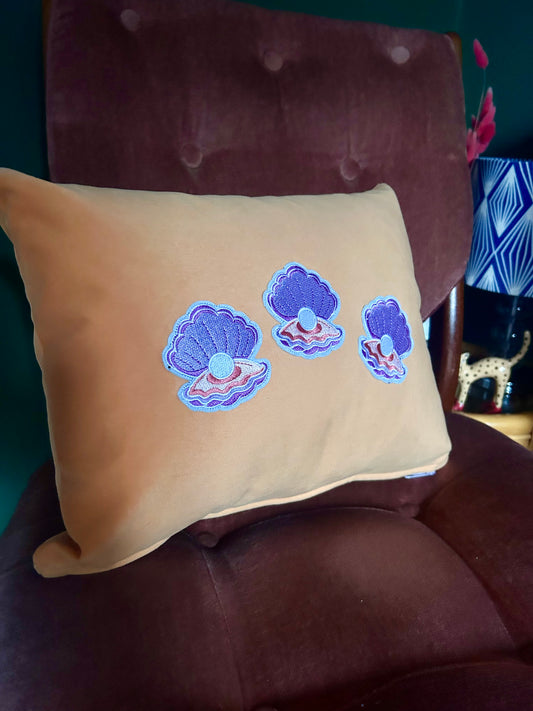 Velvet oyster and pearl cushion