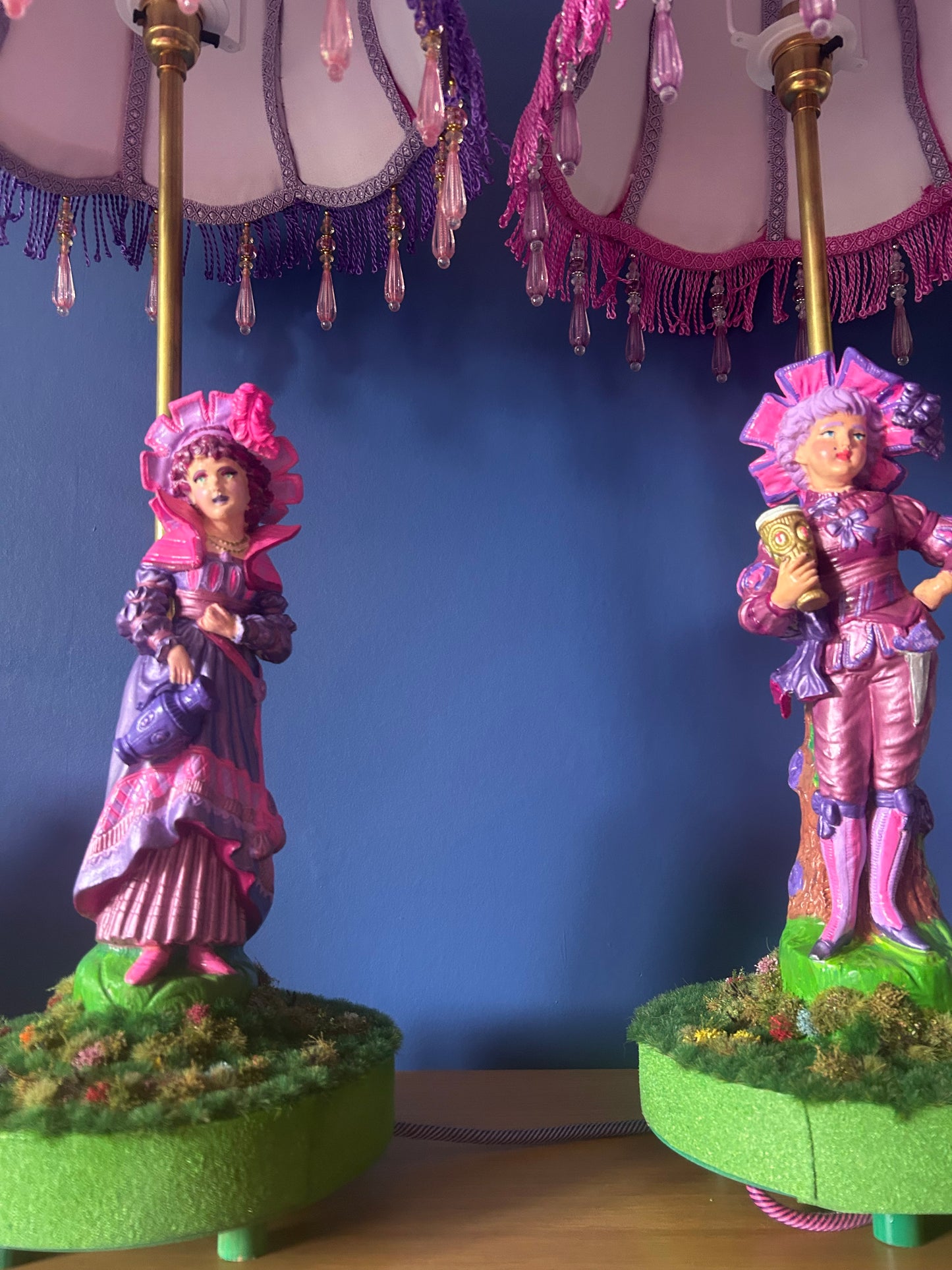 Figurine lamps with colourful scalloped lampshades