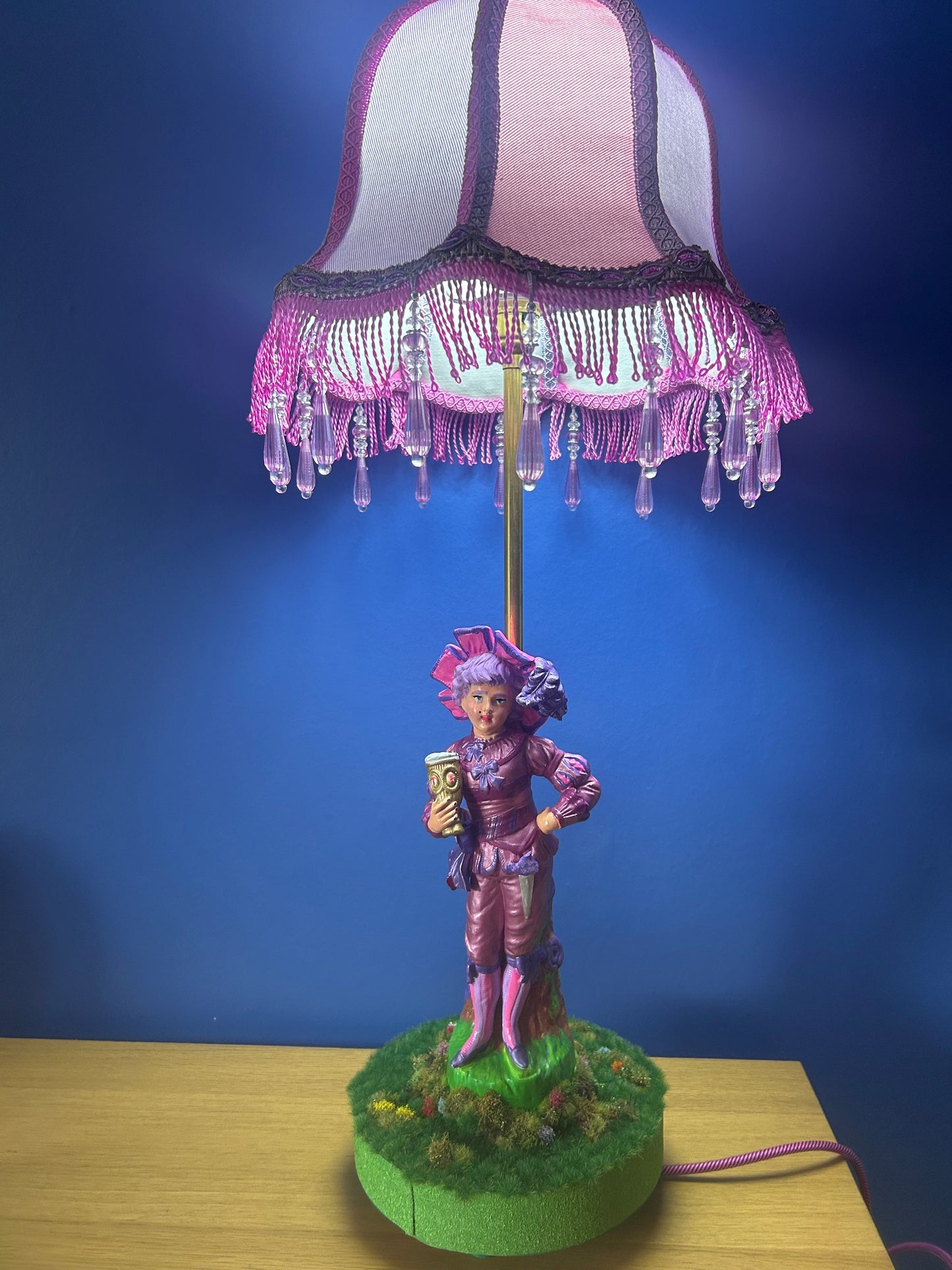 Figurine lamps with colourful scalloped lampshades