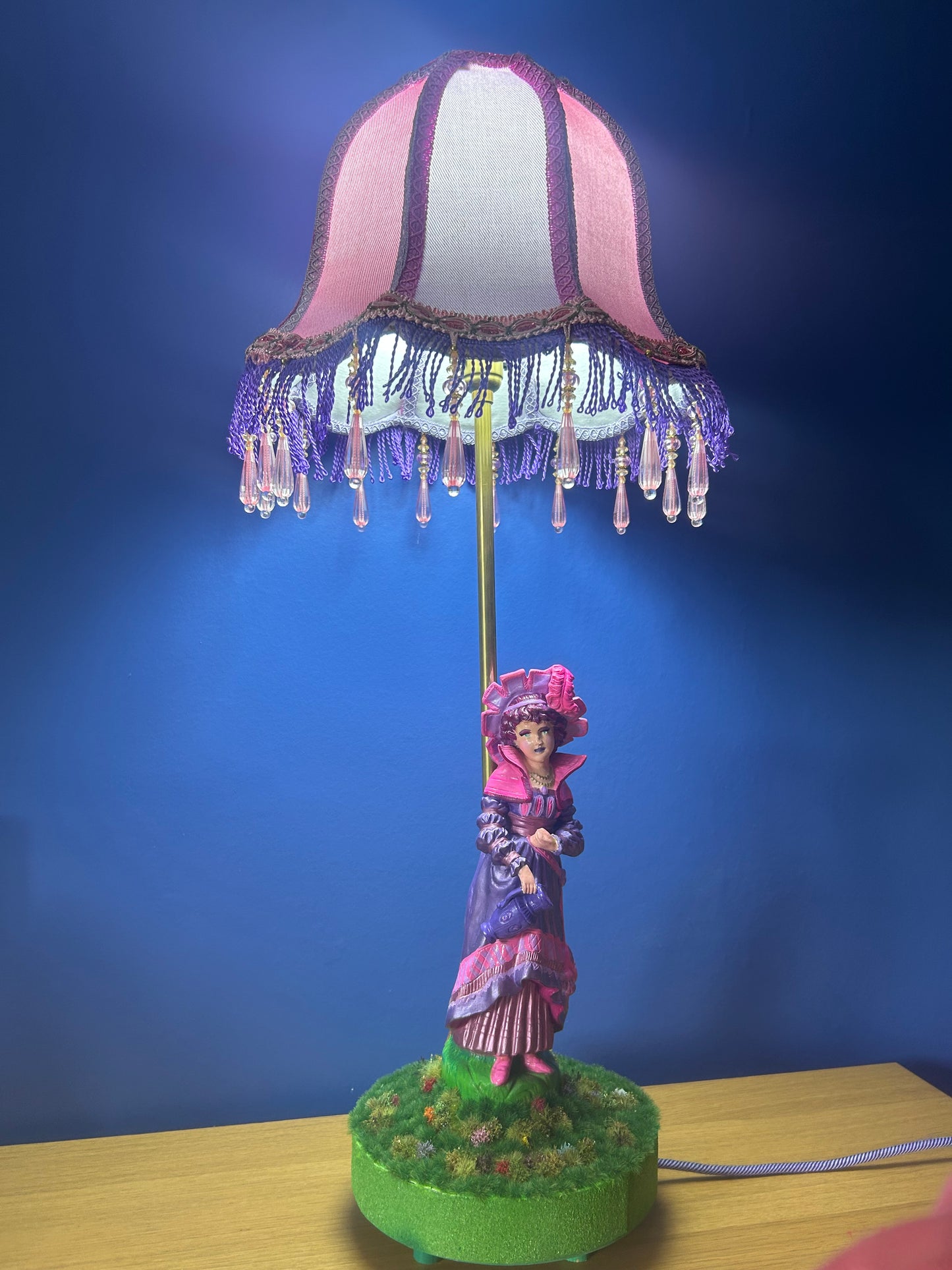 Figurine lamps with colourful scalloped lampshades