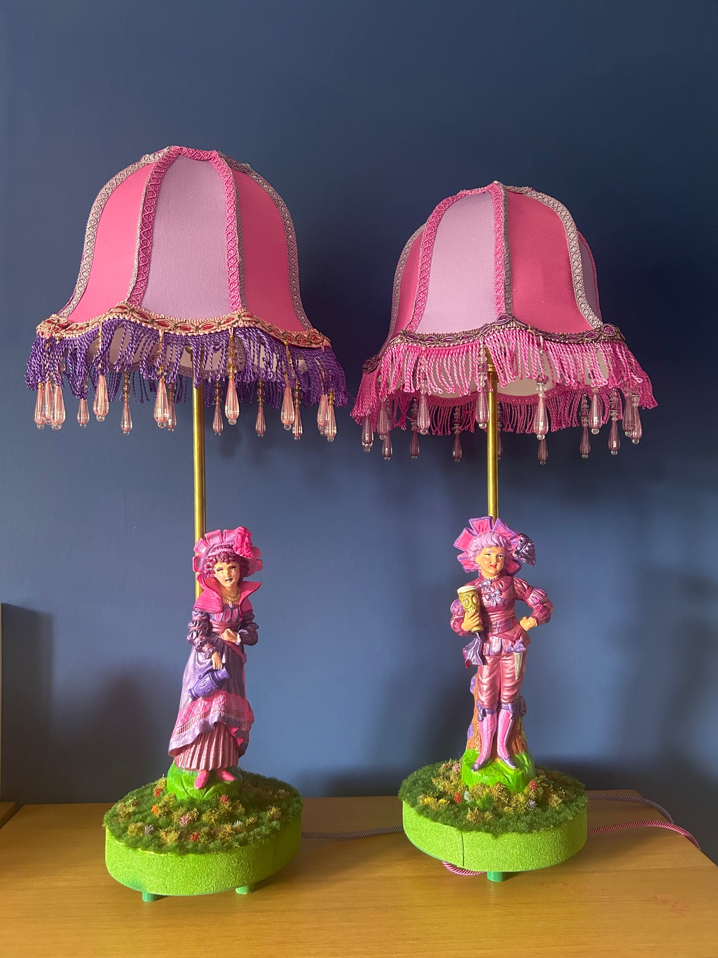 Figurine lamps with colourful scalloped lampshades