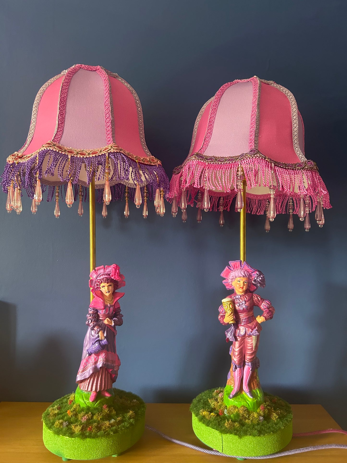 Figurine lamps with colourful scalloped lampshades