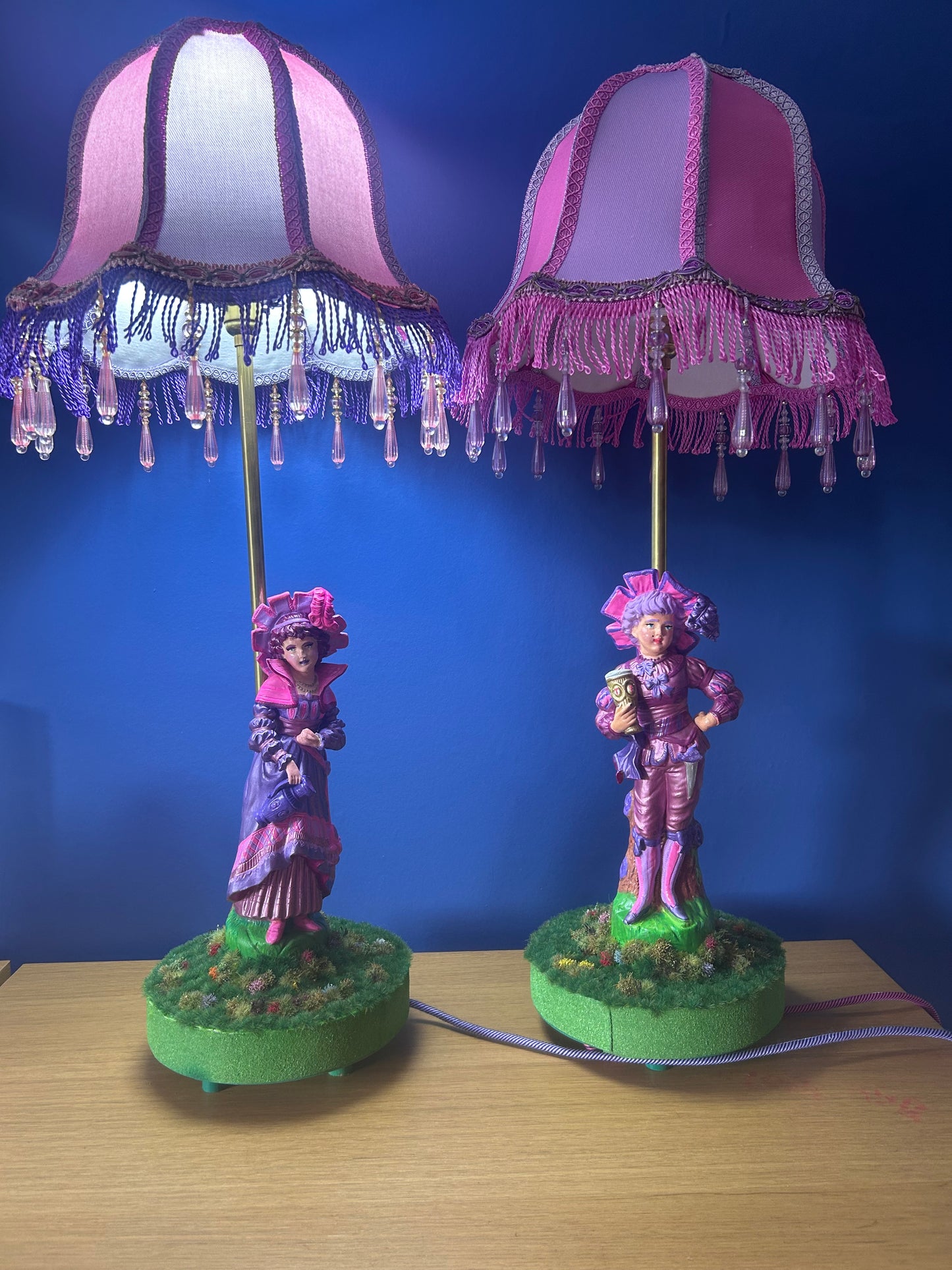 Figurine lamps with colourful scalloped lampshades