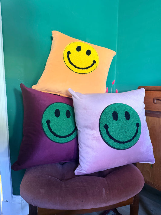 Velvet smiley face cushion