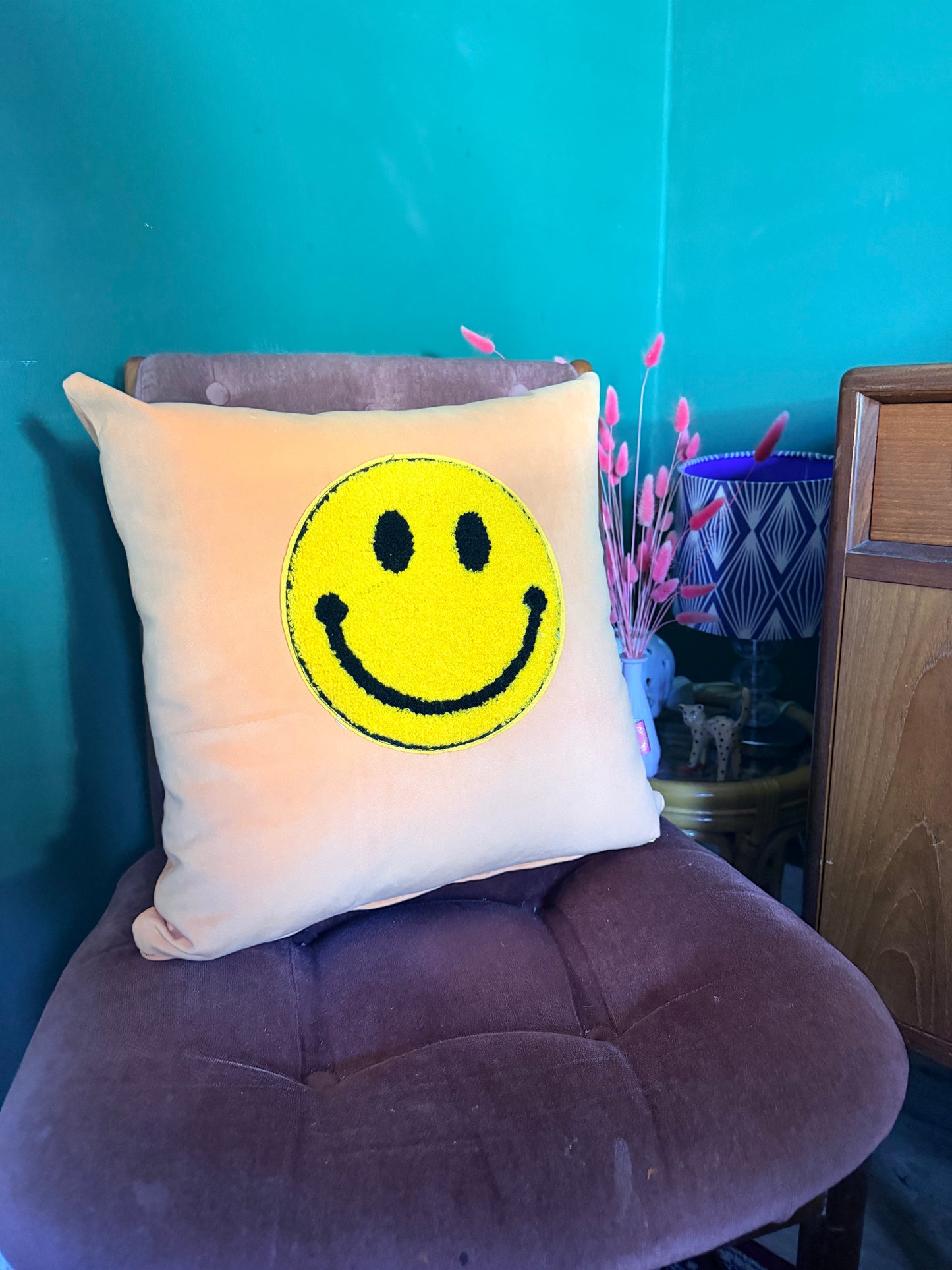 Velvet smiley face cushion